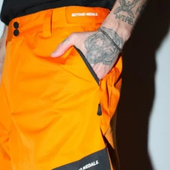 Zip Pants Orange -Ski Apparatuur Winkel beyond medals zip pants orange close